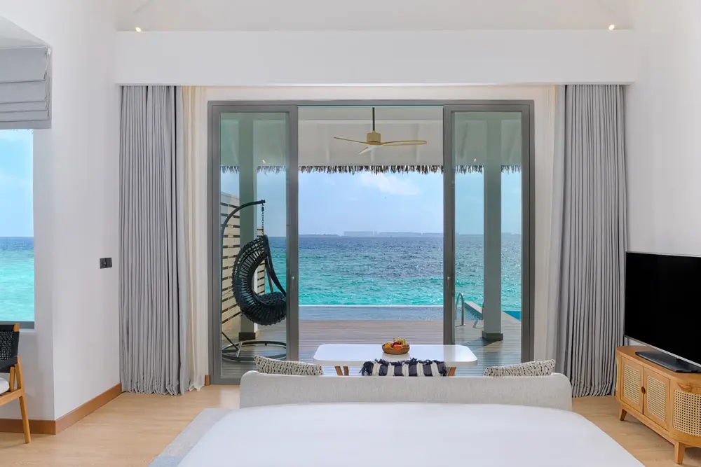 Dusit D2 Madlvies Overwater Pool Villa, View from the Bed